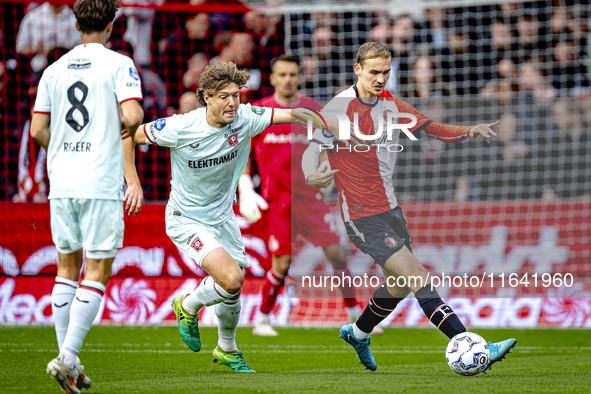 FC Twente forward Sam Lammers and Feyenoord Rotterdam defender Thomas Beelen play during the match between Feyenoord and Twente at the Feyen...