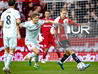 FC Twente forward Sam Lammers and Feyenoord Rotterdam defender Thomas Beelen play during the match between Feyenoord and Twente at the Feyen...