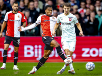 Feyenoord Rotterdam midfielder Quinten Timber and FC Twente midfielder Youri Regeer play during the match between Feyenoord and Twente at th...