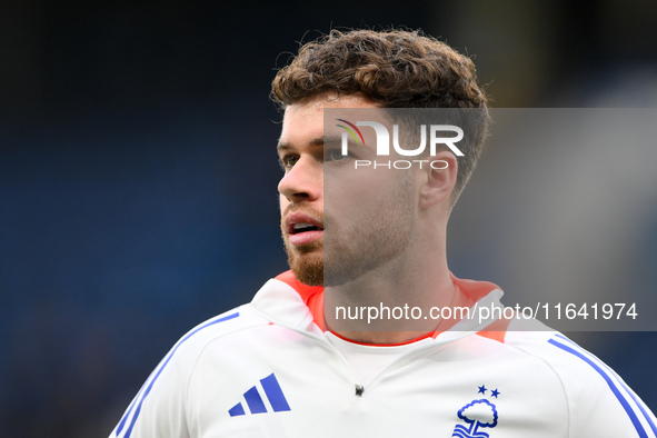 Neco Williams of Nottingham Forest warms up ahead of kick-off during the Premier League match between Chelsea and Nottingham Forest at Stamf...