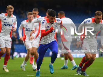 Morgan Gibbs-White of Nottingham Forest warms up ahead of kick-off during the Premier League match between Chelsea and Nottingham Forest at...