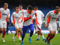 Morgan Gibbs-White of Nottingham Forest warms up ahead of kick-off during the Premier League match between Chelsea and Nottingham Forest at...