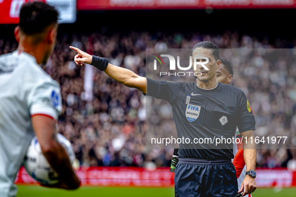 Referee Serdar Gozubuyuk officiates the match between Feyenoord and Twente at the Feyenoord stadium De Kuip for the Dutch Eredivisie season...