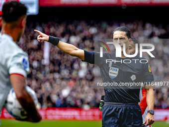 Referee Serdar Gozubuyuk officiates the match between Feyenoord and Twente at the Feyenoord stadium De Kuip for the Dutch Eredivisie season...