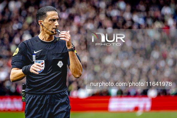 Referee Serdar Gozubuyuk officiates the match between Feyenoord and Twente at the Feyenoord stadium De Kuip for the Dutch Eredivisie season...