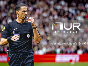 Referee Serdar Gozubuyuk officiates the match between Feyenoord and Twente at the Feyenoord stadium De Kuip for the Dutch Eredivisie season...