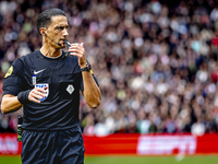 Referee Serdar Gozubuyuk officiates the match between Feyenoord and Twente at the Feyenoord stadium De Kuip for the Dutch Eredivisie season...