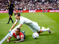 Feyenoord Rotterdam forward Igor Paixao and FC Twente midfielder Youri Regeer play during the match between Feyenoord and Twente at the Feye...