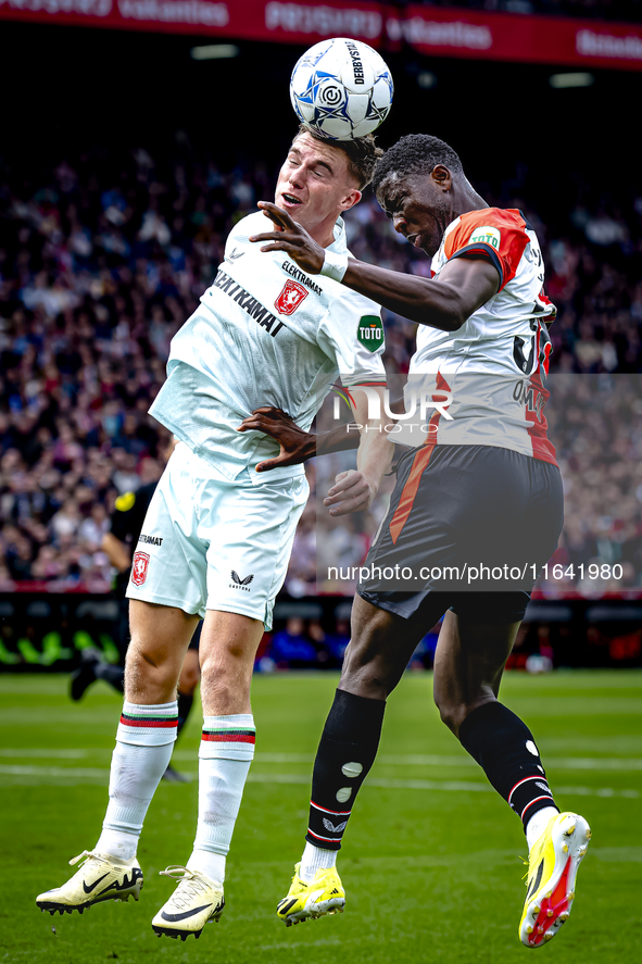 FC Twente forward Daan Rots and Feyenoord Rotterdam forward Ibrahim Osman play during the match between Feyenoord and Twente at the Feyenoor...