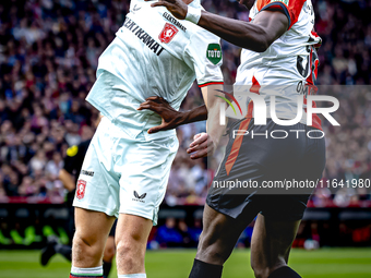 FC Twente forward Daan Rots and Feyenoord Rotterdam forward Ibrahim Osman play during the match between Feyenoord and Twente at the Feyenoor...