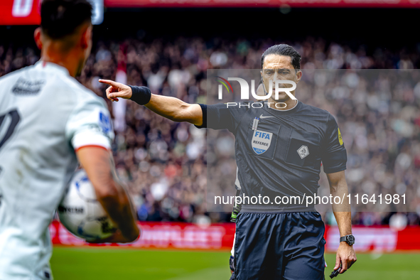 Referee Serdar Gozubuyuk officiates the match between Feyenoord and Twente at the Feyenoord stadium De Kuip for the Dutch Eredivisie season...