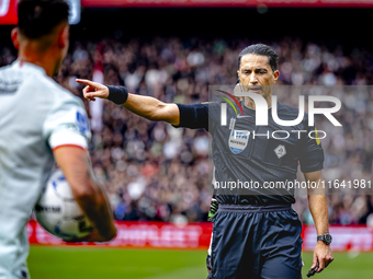 Referee Serdar Gozubuyuk officiates the match between Feyenoord and Twente at the Feyenoord stadium De Kuip for the Dutch Eredivisie season...