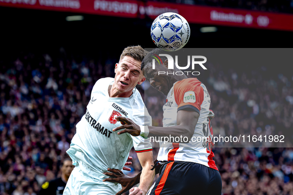 FC Twente forward Daan Rots and Feyenoord Rotterdam forward Ibrahim Osman play during the match between Feyenoord and Twente at the Feyenoor...