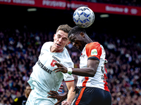 FC Twente forward Daan Rots and Feyenoord Rotterdam forward Ibrahim Osman play during the match between Feyenoord and Twente at the Feyenoor...