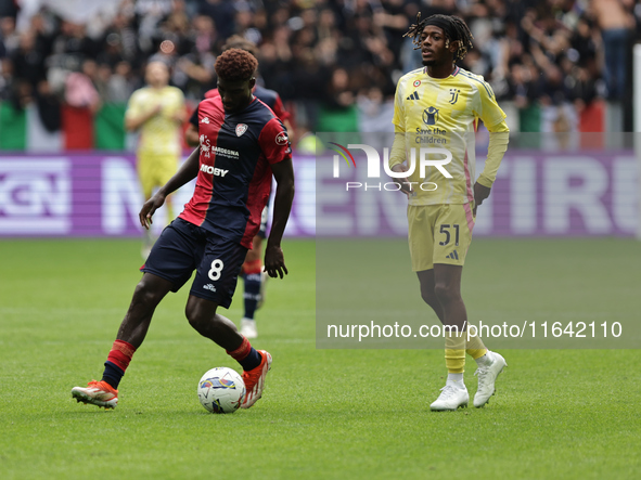 Michel Adopo participates in the Serie A 2024-2025 match between Juventus and Como in Turin, Italy, on August 19, 2024. 