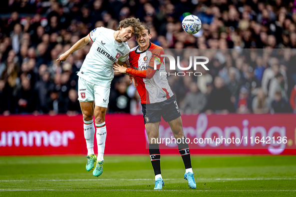 FC Twente forward Sam Lammers and Feyenoord Rotterdam defender Thomas Beelen play during the match between Feyenoord and Twente at the Feyen...