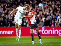 FC Twente forward Sam Lammers and Feyenoord Rotterdam defender Thomas Beelen play during the match between Feyenoord and Twente at the Feyen...