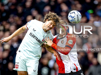 FC Twente forward Sam Lammers and Feyenoord Rotterdam defender Thomas Beelen play during the match between Feyenoord and Twente at the Feyen...