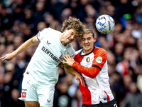 FC Twente forward Sam Lammers and Feyenoord Rotterdam defender Thomas Beelen play during the match between Feyenoord and Twente at the Feyen...