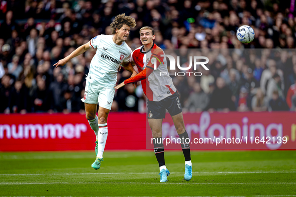 FC Twente forward Sam Lammers and Feyenoord Rotterdam defender Thomas Beelen play during the match between Feyenoord and Twente at the Feyen...