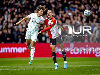 FC Twente forward Sam Lammers and Feyenoord Rotterdam defender Thomas Beelen play during the match between Feyenoord and Twente at the Feyen...