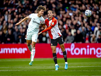 FC Twente forward Sam Lammers and Feyenoord Rotterdam defender Thomas Beelen play during the match between Feyenoord and Twente at the Feyen...