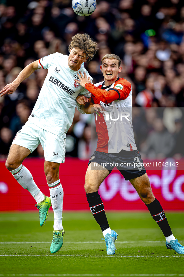 FC Twente forward Sam Lammers and Feyenoord Rotterdam defender Thomas Beelen play during the match between Feyenoord and Twente at the Feyen...