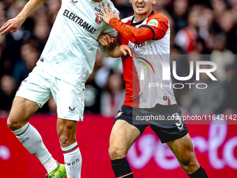 FC Twente forward Sam Lammers and Feyenoord Rotterdam defender Thomas Beelen play during the match between Feyenoord and Twente at the Feyen...