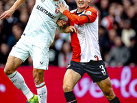 FC Twente forward Sam Lammers and Feyenoord Rotterdam defender Thomas Beelen play during the match between Feyenoord and Twente at the Feyen...