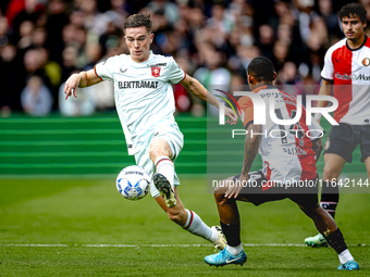 FC Twente forward Daan Rots and Feyenoord Rotterdam forward Igor Paixao play during the match between Feyenoord and Twente at the Feyenoord...