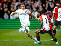 FC Twente forward Daan Rots and Feyenoord Rotterdam forward Igor Paixao play during the match between Feyenoord and Twente at the Feyenoord...