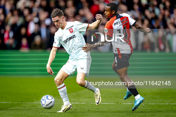 FC Twente forward Daan Rots and Feyenoord Rotterdam forward Igor Paixao play during the match between Feyenoord and Twente at the Feyenoord...