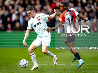 FC Twente forward Daan Rots and Feyenoord Rotterdam forward Igor Paixao play during the match between Feyenoord and Twente at the Feyenoord...