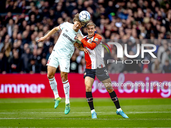 FC Twente forward Sam Lammers and Feyenoord Rotterdam defender Thomas Beelen play during the match between Feyenoord and Twente at the Feyen...