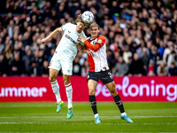 FC Twente forward Sam Lammers and Feyenoord Rotterdam defender Thomas Beelen play during the match between Feyenoord and Twente at the Feyen...