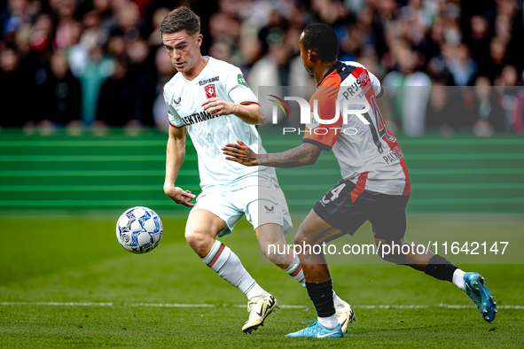 FC Twente forward Daan Rots and Feyenoord Rotterdam forward Igor Paixao play during the match between Feyenoord and Twente at the Feyenoord...