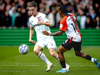 FC Twente forward Daan Rots and Feyenoord Rotterdam forward Igor Paixao play during the match between Feyenoord and Twente at the Feyenoord...