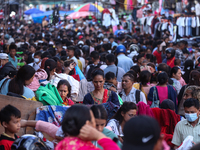 Nepalese customers visit the market to select gifts for family members for the upcoming Dashain festival in Laltipur, Nepal, on October 6, 2...