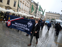 Participants of the All-Polish Youth March, a far-right ultranationalist organization, pass through the Main Square in Krakow, Poland, on Oc...