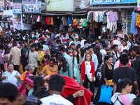 Nepalese customers visit the market to select gifts for family members for the upcoming Dashain festival in Laltipur, Nepal, on October 6, 2...