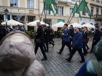 Participants of the All-Polish Youth March, a far-right ultranationalist organization, pass through the Main Square in Krakow, Poland, on Oc...