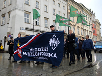 Participants of the All-Polish Youth March, a far-right ultranationalist organization, pass through the Main Square in Krakow, Poland, on Oc...