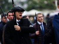 Participants of the All-Polish Youth March, a far-right ultranationalist organization, pass through the Main Square in Krakow, Poland, on Oc...