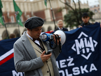 Participants of the All-Polish Youth March, a far-right ultranationalist organization, pass through the Main Square in Krakow, Poland, on Oc...