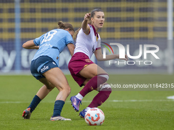 Seraina Piubel #77 of West Ham United F.C. is tackled by Kerstin Casparij #18 of Manchester City W.F.C. during the Barclays FA Women's Super...