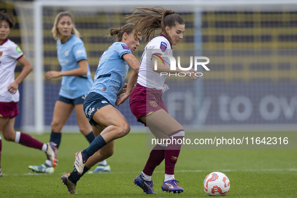 Seraina Piubel #77 of West Ham United F.C. is tackled by Kerstin Casparij #18 of Manchester City W.F.C. during the Barclays FA Women's Super...