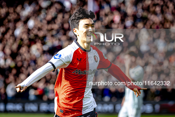 Feyenoord Rotterdam midfielder Inbeom Hwang scores the 2-0 and celebrates the goal during the match between Feyenoord and Twente at the Feye...