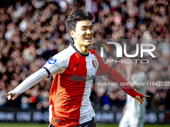 Feyenoord Rotterdam midfielder Inbeom Hwang scores the 2-0 and celebrates the goal during the match between Feyenoord and Twente at the Feye...