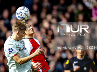 FC Twente midfielder Sem Steijn and Feyenoord Rotterdam forward Ayase Ueda play during the match between Feyenoord and Twente at the Feyenoo...