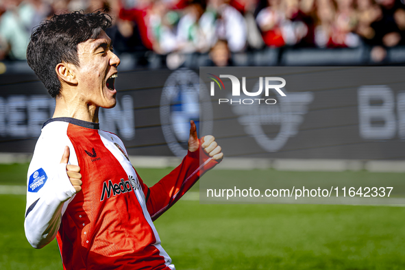 Feyenoord Rotterdam midfielder Inbeom Hwang scores the 2-0 and celebrates the goal during the match between Feyenoord and Twente at the Feye...